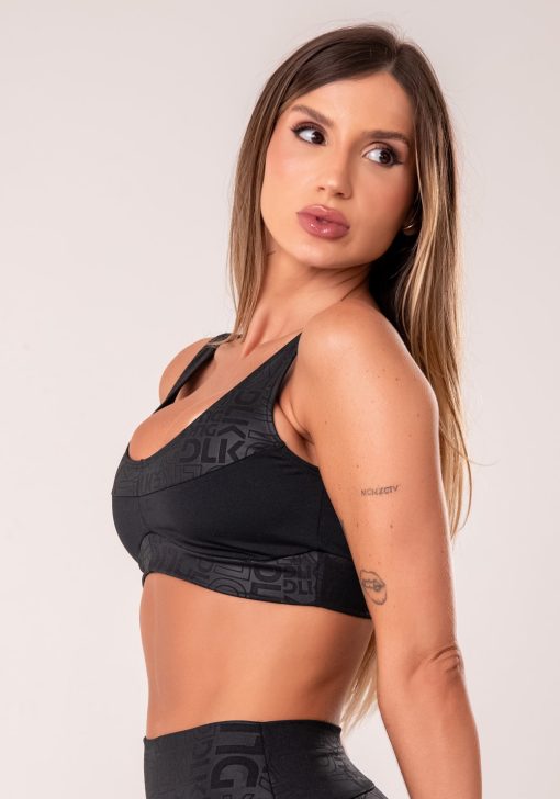 Top fitness feminino preto com recortes logomania reflections - Image 4